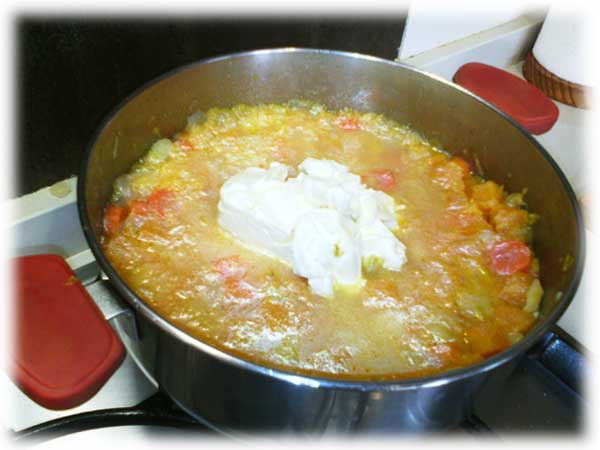 Añadir el caldo y el Queso